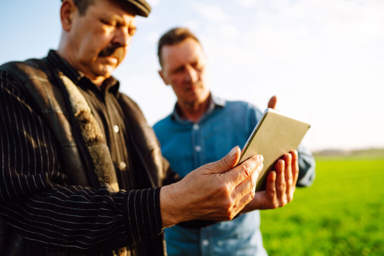 anw-two-farmers-uses-a-specialized-app-on-digital-tabl